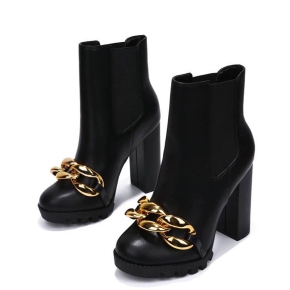 CHUNKY HIGH HEEL BOOTIE WITH A SMALL PLATFORM ROUND TOE AND CHAIN DETAIL. - Picture 1 of 3